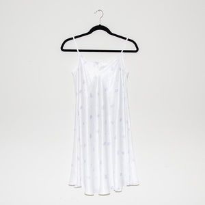 White silk dress with blue daisys